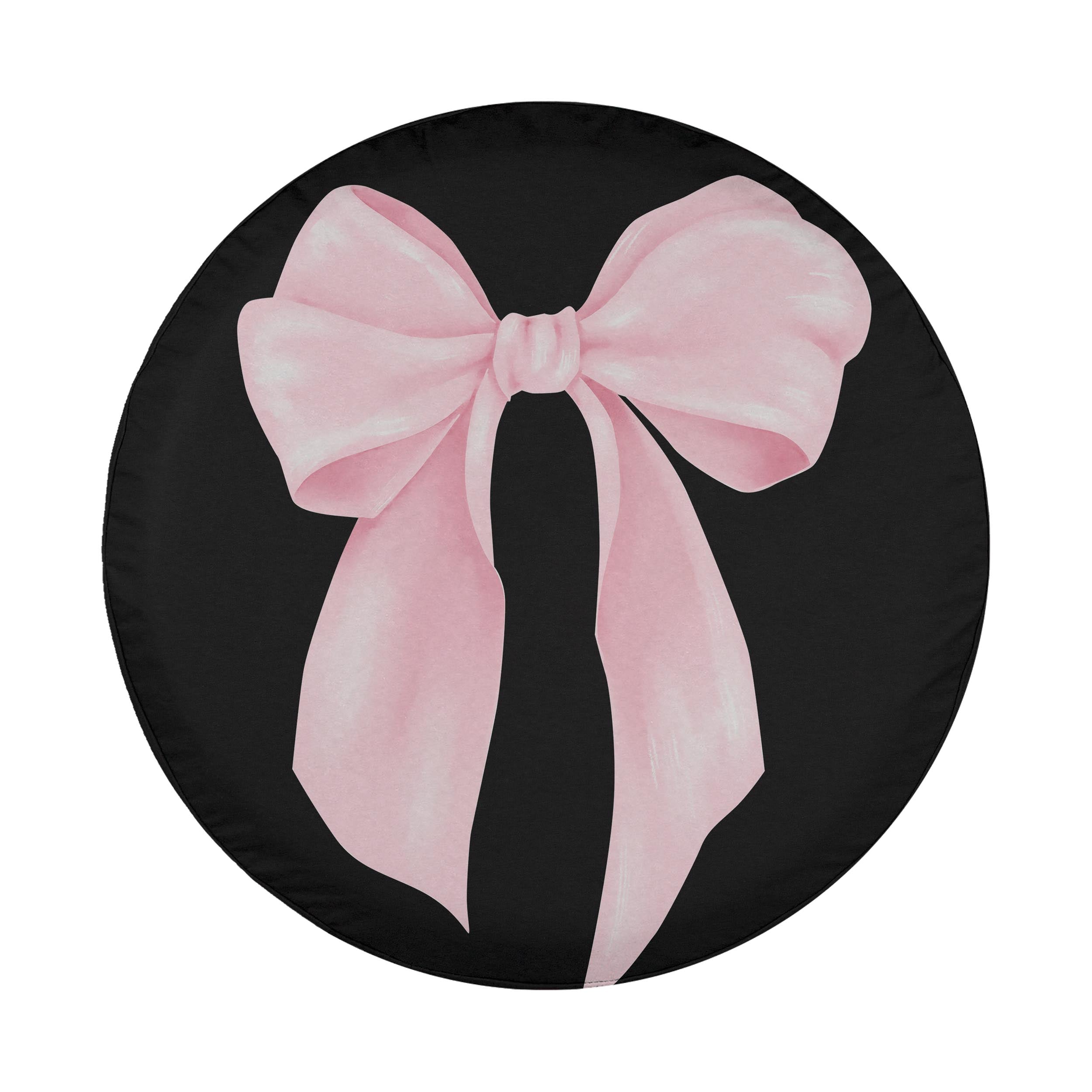 A black tire cover with a large pink bow on it.