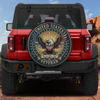 a red Jeep Wrangler with a large round decal on the rear window that says "United States Veteran" and includes an eagle.
