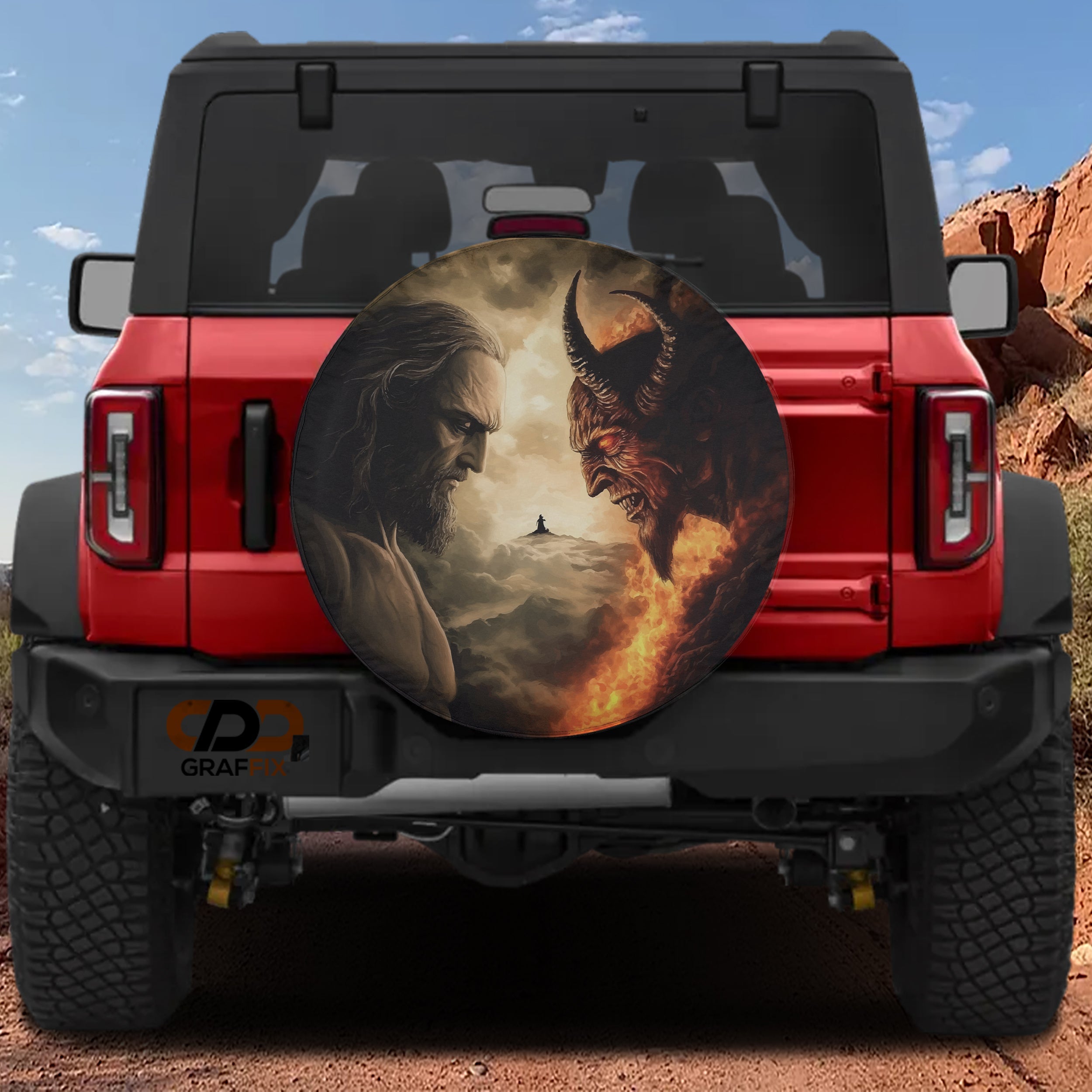 Heaven vs Hell Ultimate Battle spare tire cover on red Ford Bronco rear with sage facing fiery demon