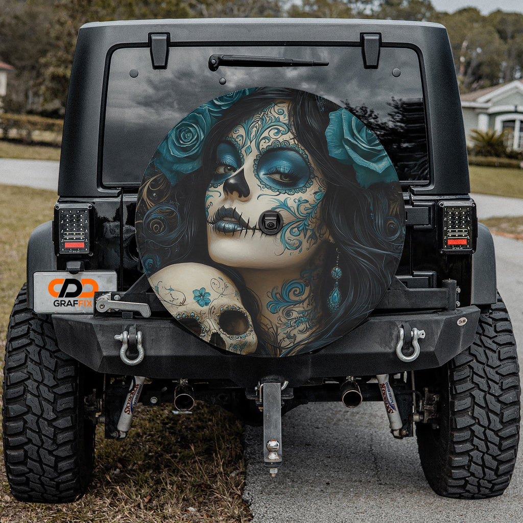 Turquoise sugar skull spare tire cover fabric and grommet closeup detail