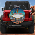 a red Jeep Wrangler with a large welcome sign on the back window.