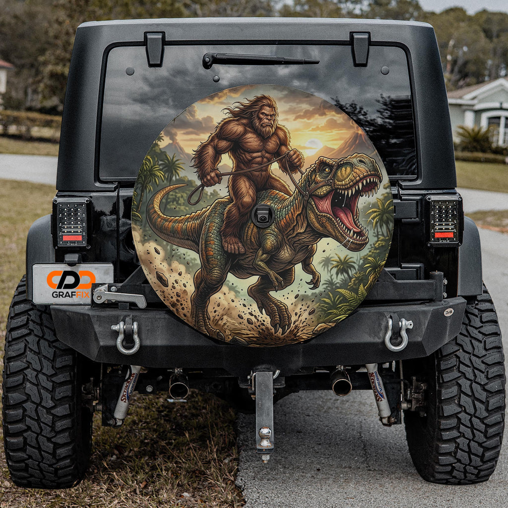 a Jeep Wrangler with a large dinosaur-themed decal on the rear window.