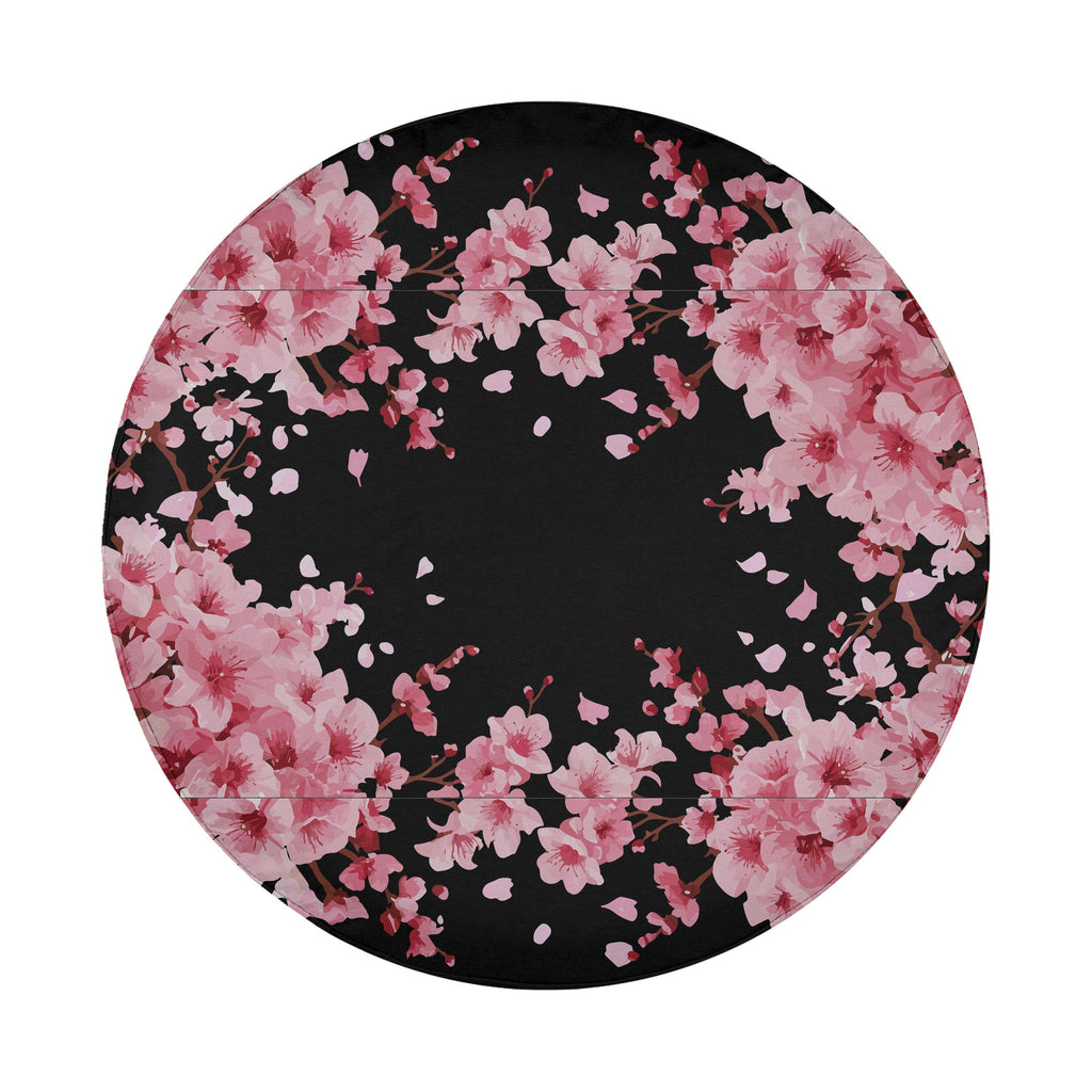 Japanese cherry blossom pink floral wreath spare tire cover standalone product photograph on black