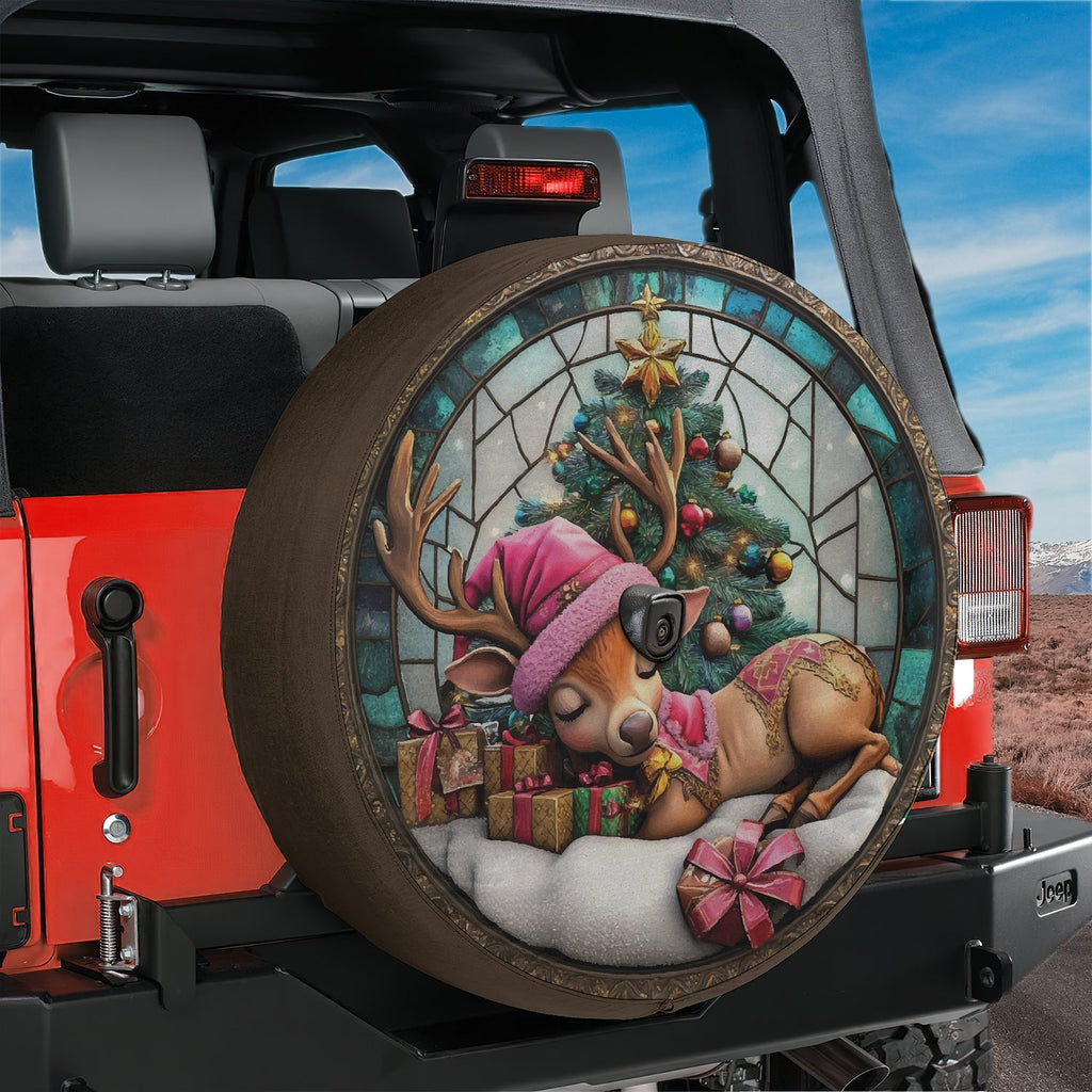 Baby Reindeer stained glass tire cover on red Jeep Wrangler featuring pink hat sleeping fawn artwork