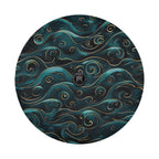 Golden teal waves tire cover closeup with backup camera cutout surrounded by swirling teal sea wave art