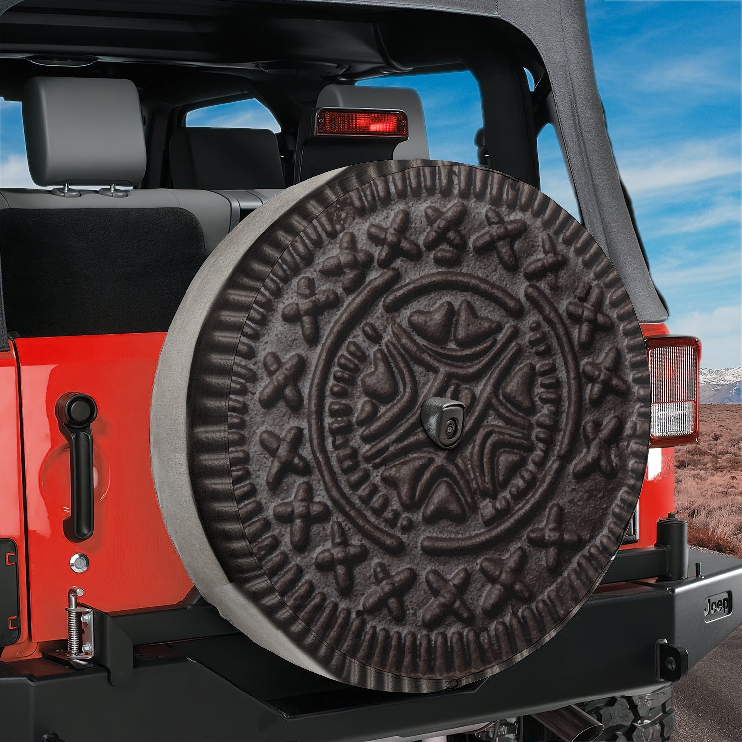 Choco Creme Cookie spare tire cover mounted on a Jeep showing the giant cookie centered behind the rear bumper