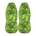 a pair of green, furry objects that appear to be made of a soft, fuzzy material.
