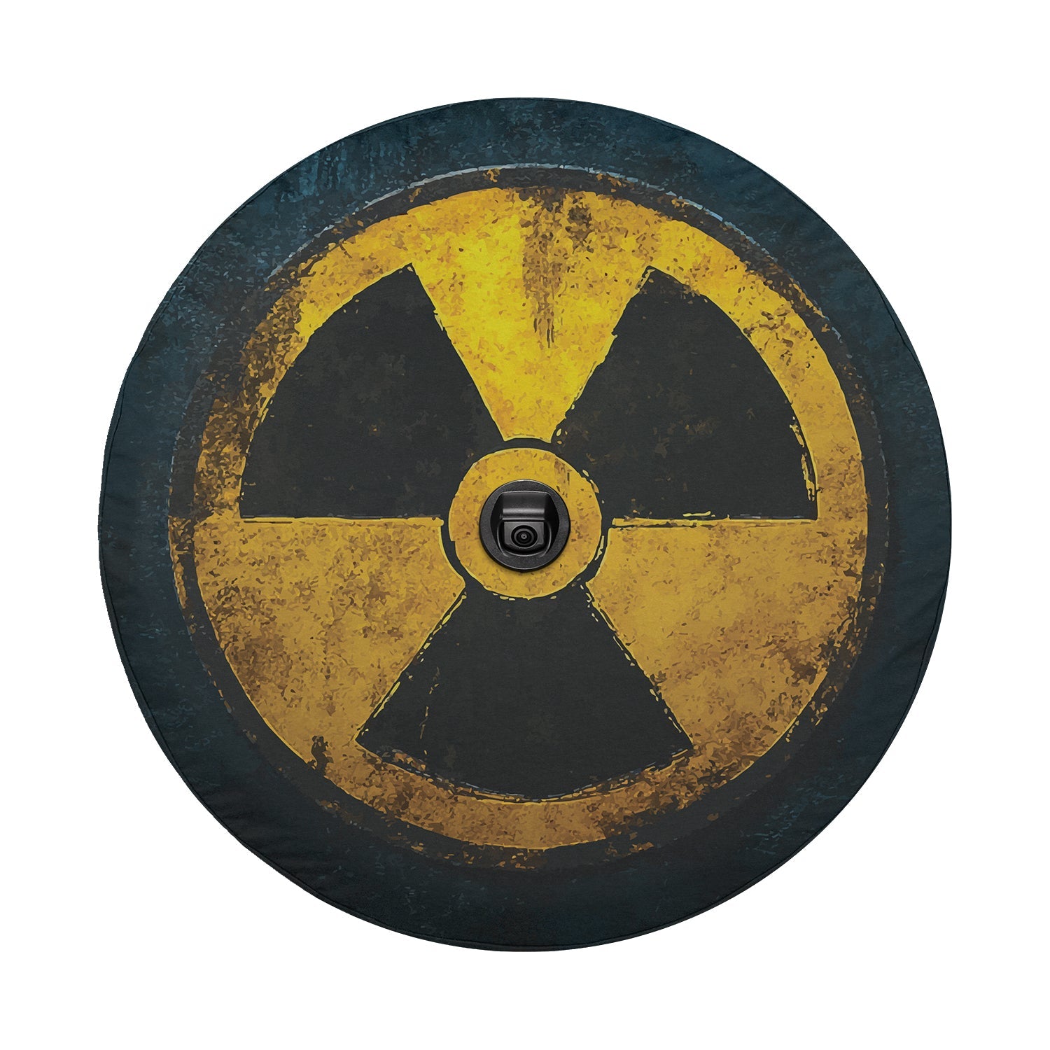 Detail of fallout shelter spare tire cover showing distressed yellow radiation symbol art on dark canvas