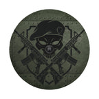 Covert Ops Badge spare tire cover view of beret skull with crossed AR-15 rifles in green panel