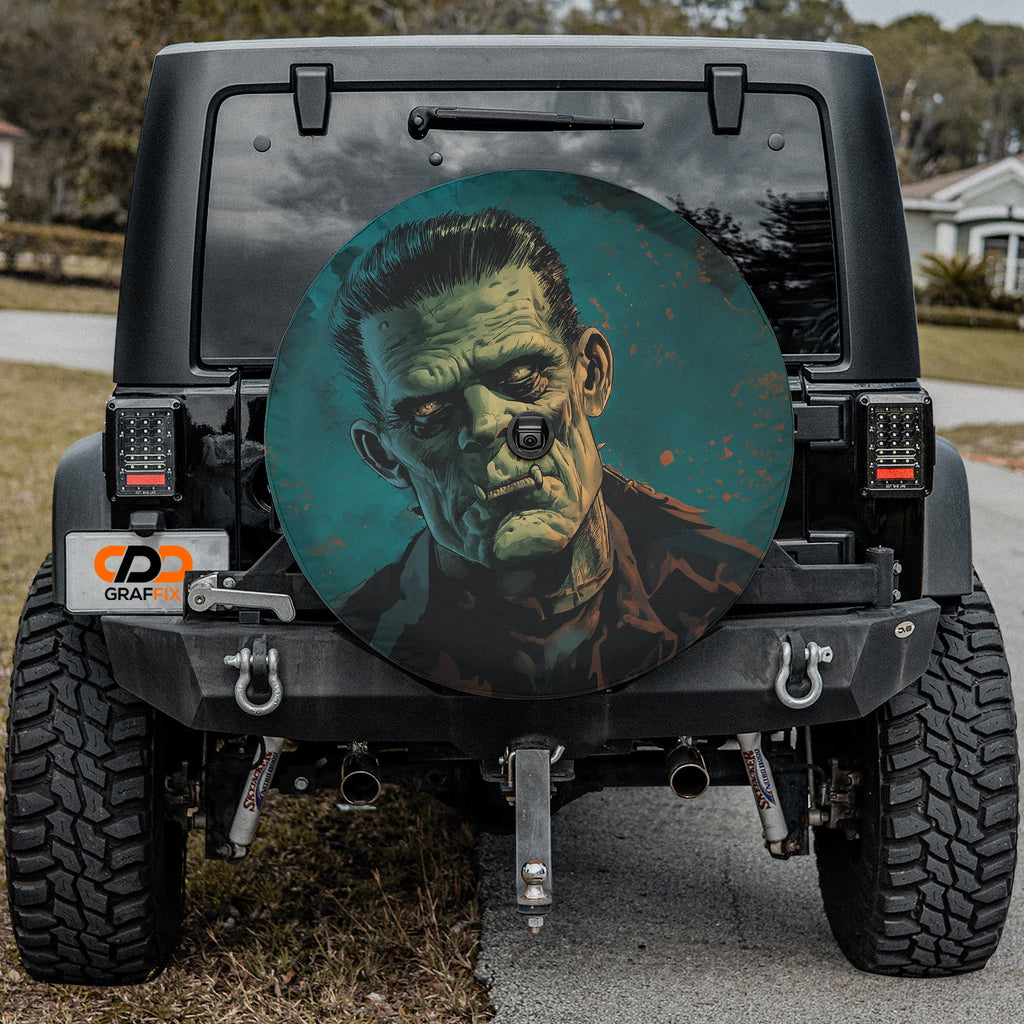 Frankenstein's Monster spare tire cover with horror movie monster mounted on Jeep tailgate