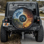 Black Jeep Wrangler displaying Wheel of Elements spare tire cover with elemental symbol design