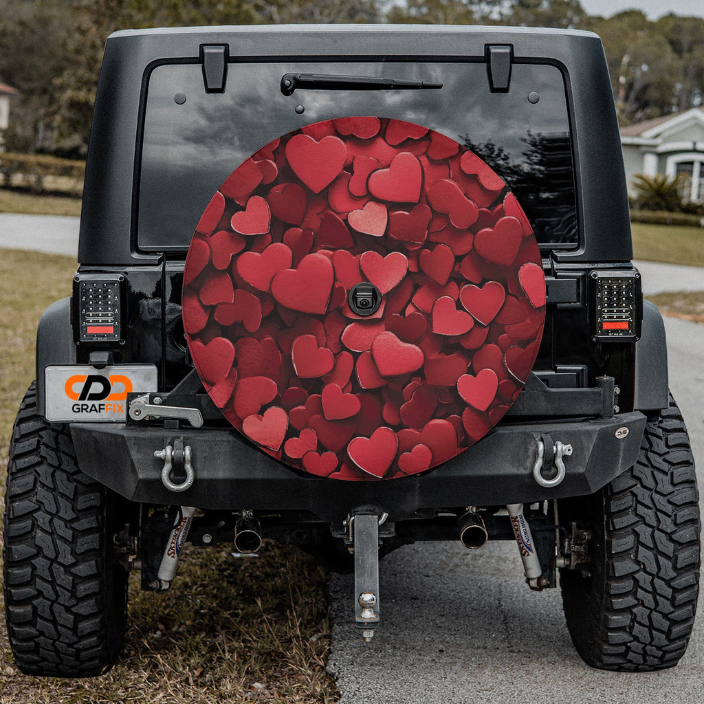 Love on Wheels spare tire cover main product render with romantic red heart all-over pattern