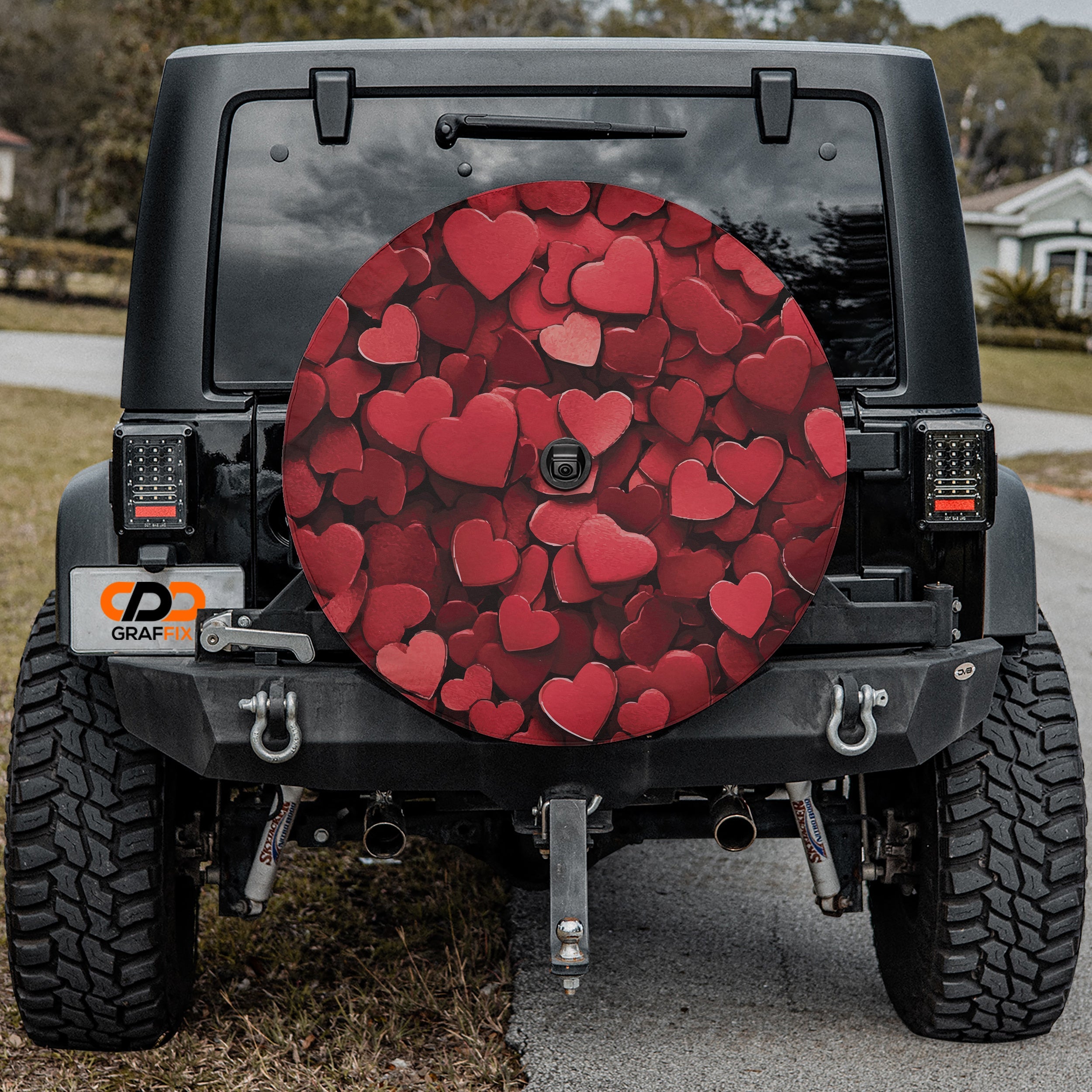 Love on Wheels spare tire cover main product render with romantic red heart all-over pattern