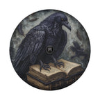 Huginn's Black Raven Tome spare tire cover flat product shot showing dark spell book with raven and rune accents