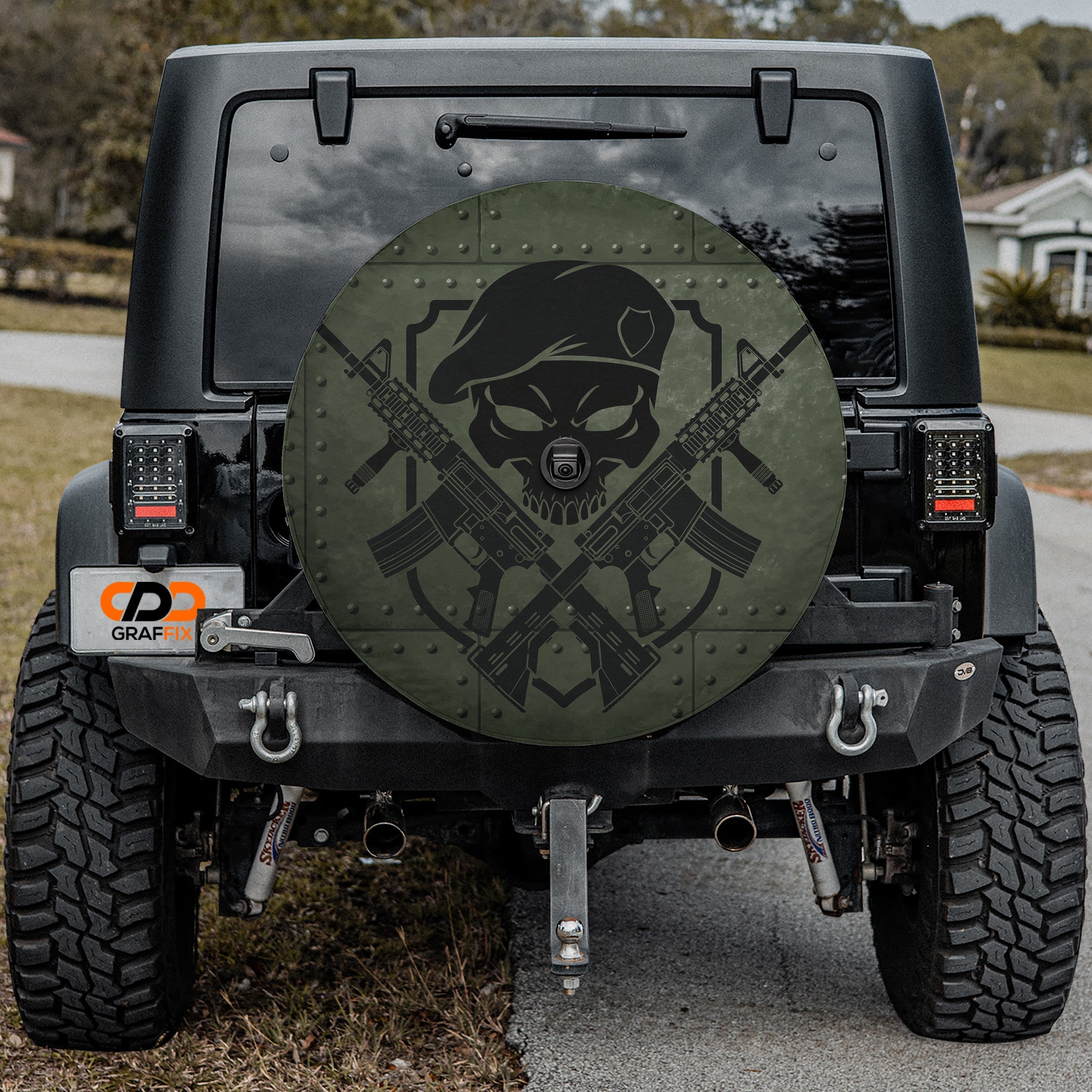Covert Ops Badge spare tire cover with military insignia mounted on Jeep Wrangler tailgate