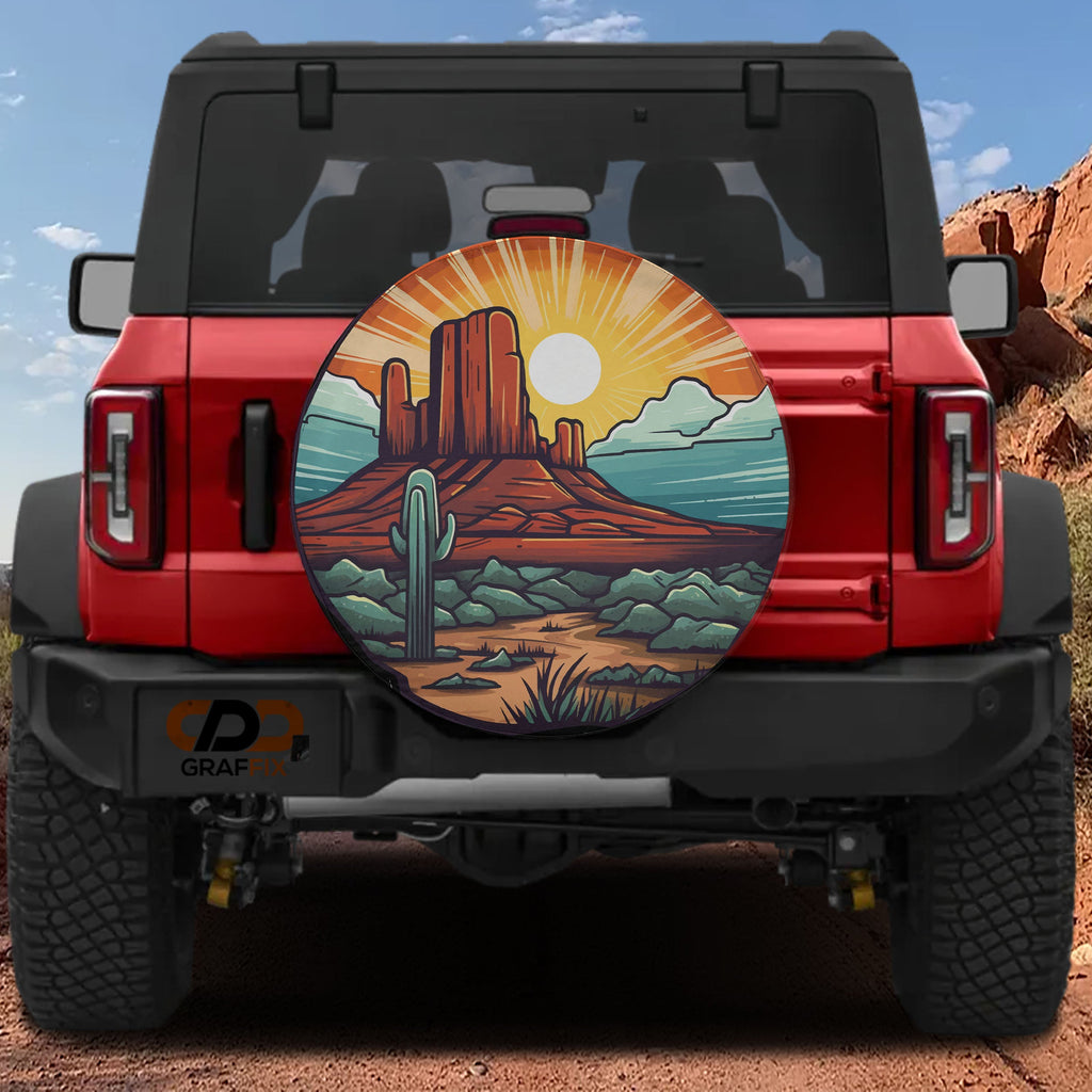 Sunset Over Sedona tire cover on a red Ford Bronco showing desert mesa cactus sunburst and turquoise sky