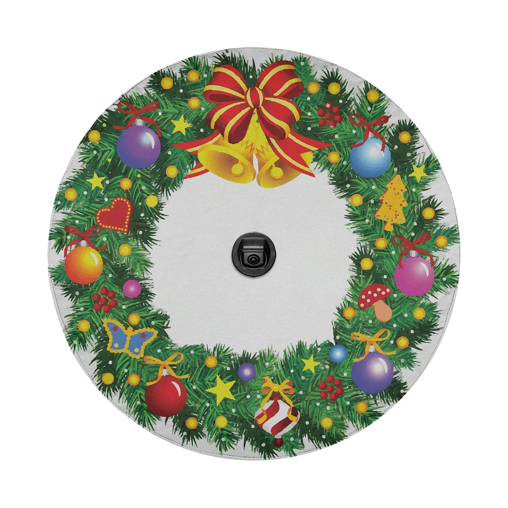 Holiday wreath spare tire cover with center backup camera hole bells ornaments and lush green pine
