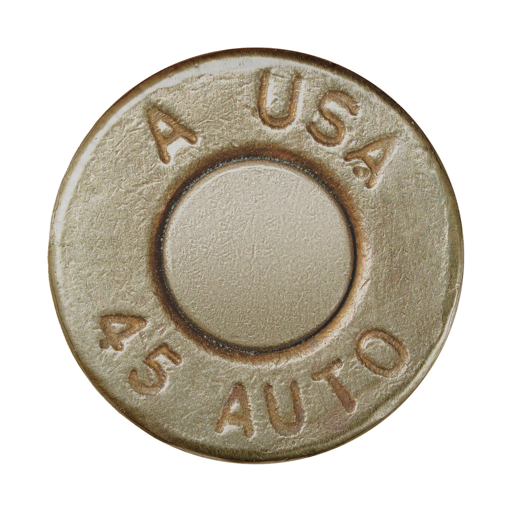 a close-up view of a metal object with embossed text and numbers.