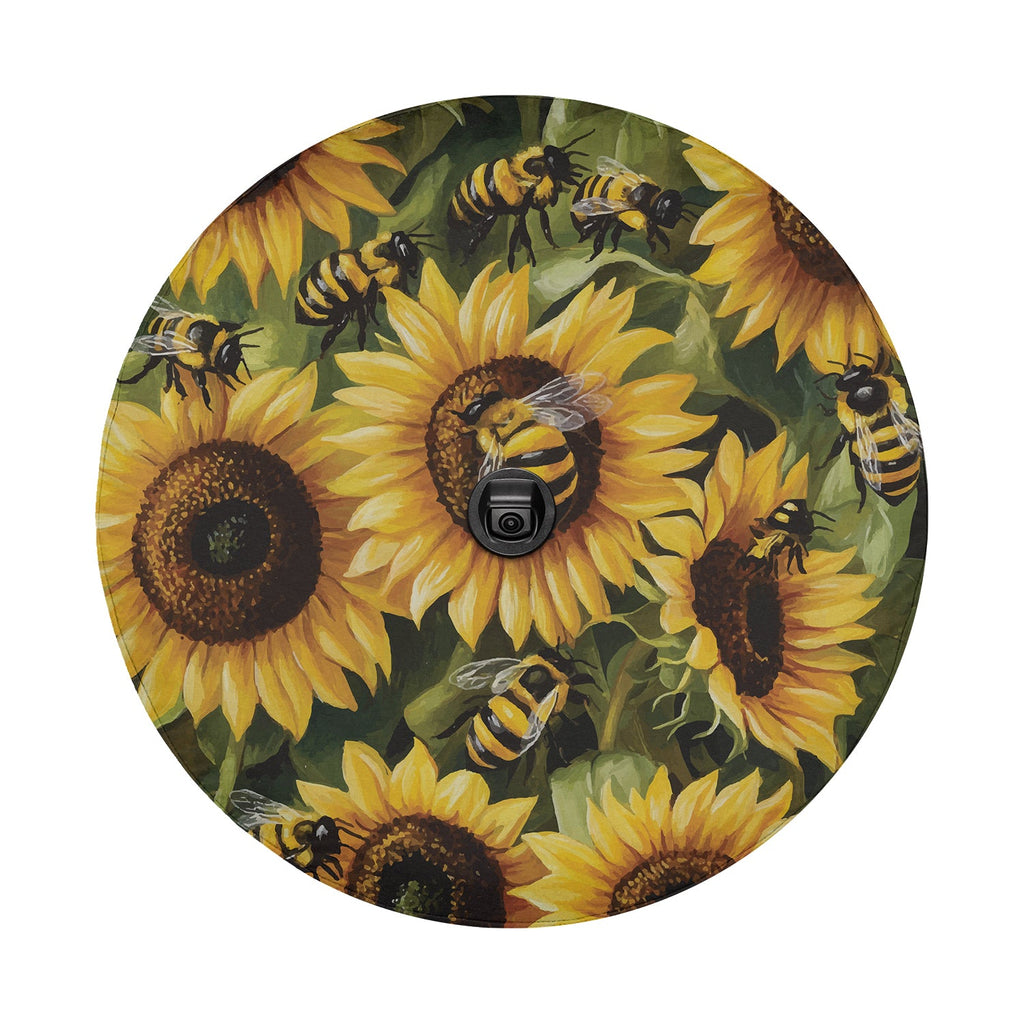 Flat round sunflower bumblebee spare tire cover closeup showing bees pollinating bright yellow blooms