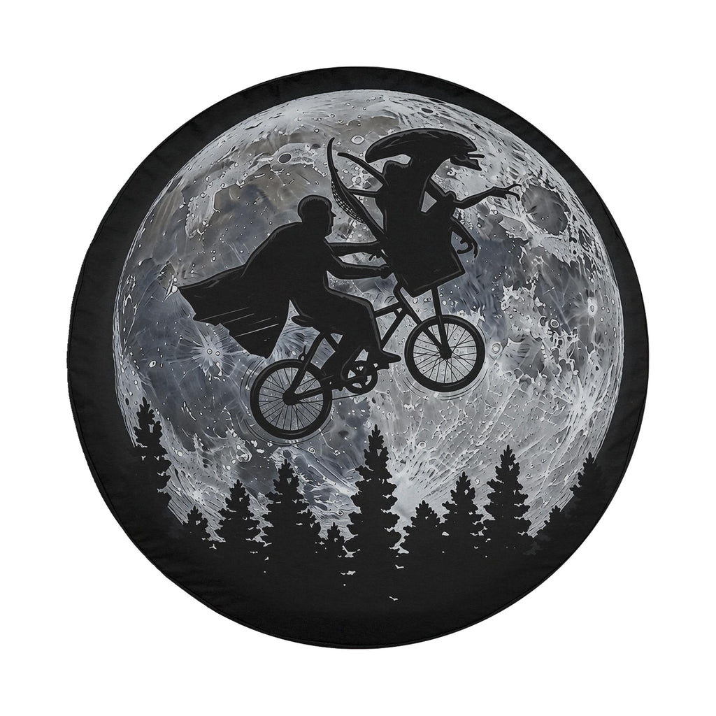 A silhouetted image of a man riding a bicycle against the backdrop of a full moon, with a woman riding a bicycle in the background.