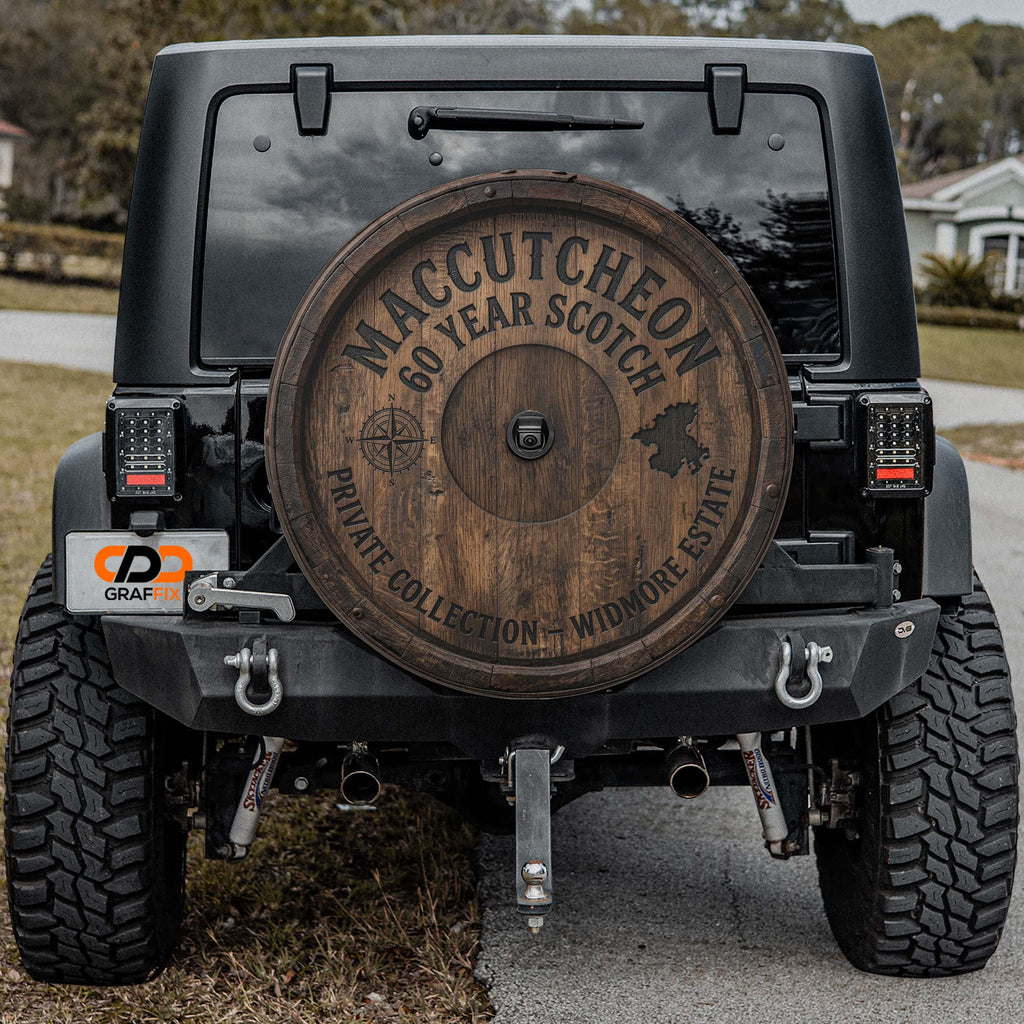 a black Jeep Wrangler with a large wooden barrel on the rear of the vehicle.