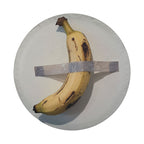 Duct-Taped Banana spare tire cover product view of yellow banana taped to white canvas board