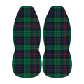 two identical car seat covers with a plaid pattern in shades of green and red.