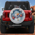 Frosty Snowman Ice Breaker spare tire cover on a red Jeep Wrangler with cheerful snowman art