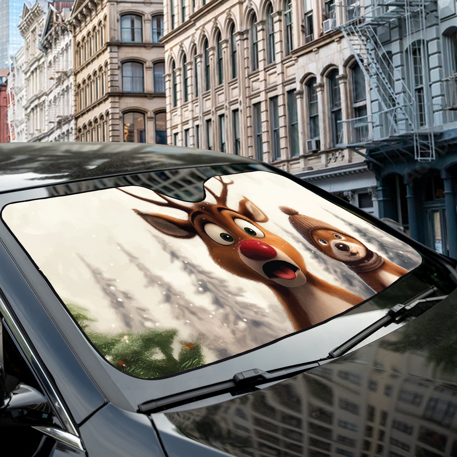 Surprised Rudolph reindeer accordion sunshade close-up installed on a dark sedan windshield exterior view