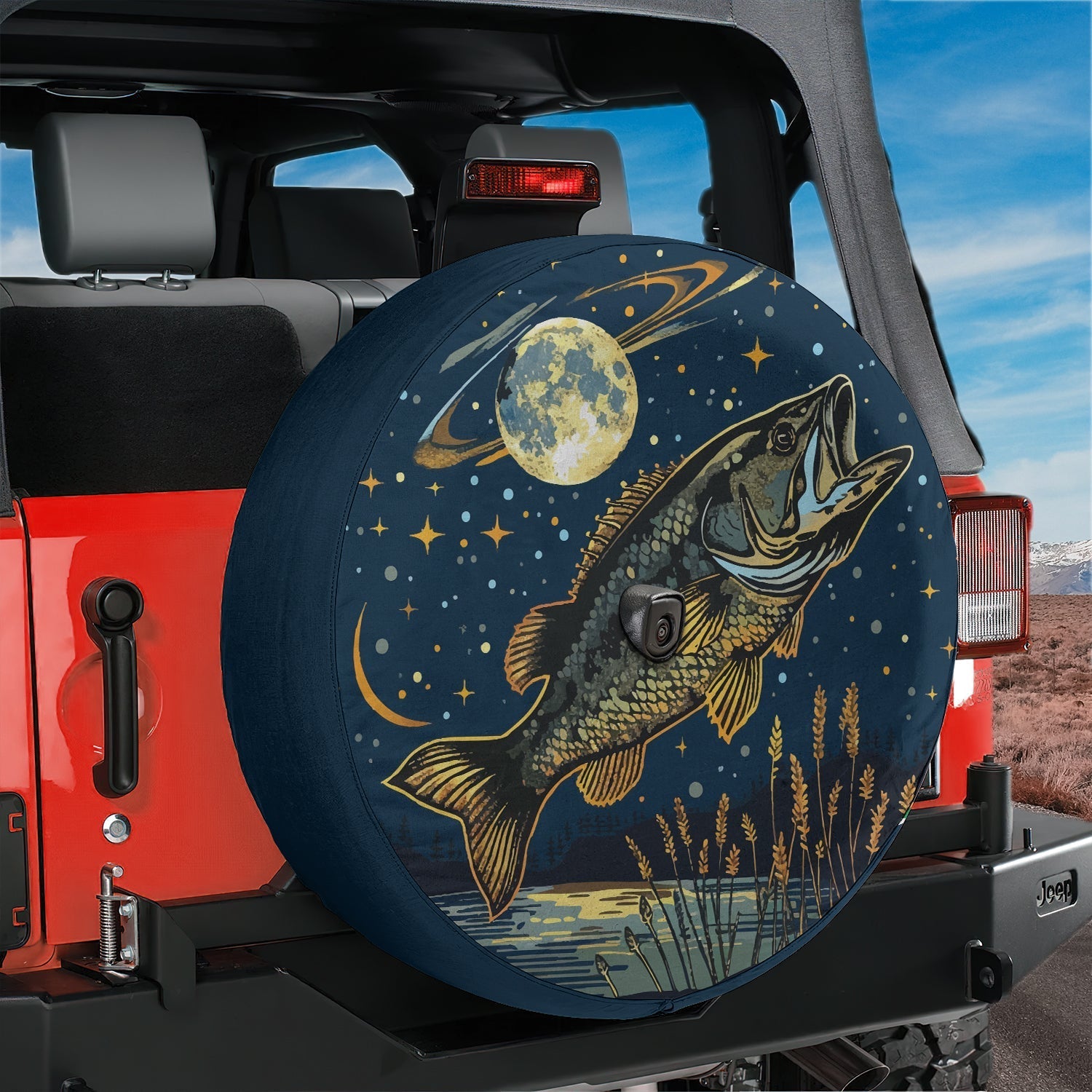 Bass moonlight spare tire cover on red Jeep Wrangler featuring golden leaping fish and crescent moon