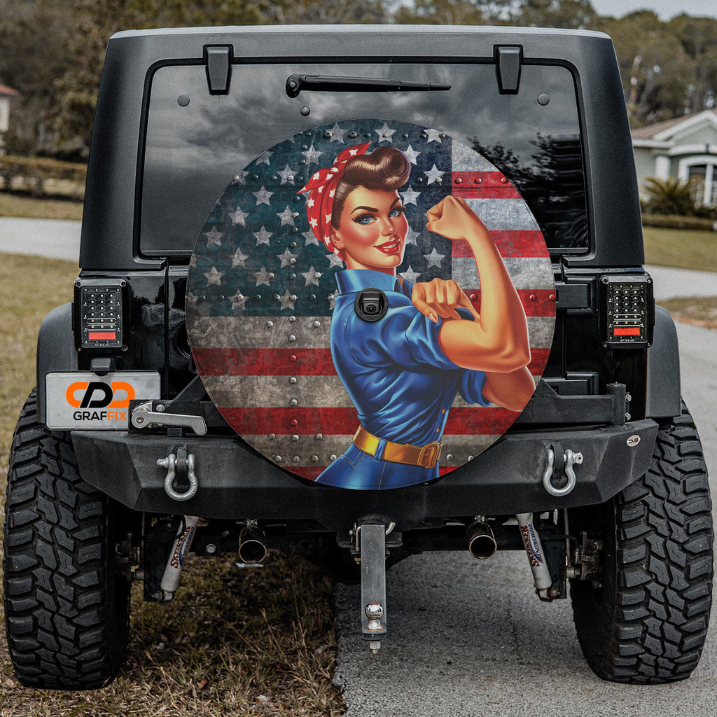 WWII Labor Woman spare tire cover with Rosie pin-up mounted on black Jeep Wrangler CDD GRAFFIX