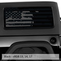 Black distressed tattered American flag decal on Jeep Wrangler hardtop rear quarter window