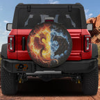 Phoenix vs Shadow Dragon spare tire cover on red Ford Bronco rear featuring fire phoenix battling dragon