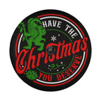 a circular design with a green gnome and the text "Have the Christmas you deserve" in red and white colors.