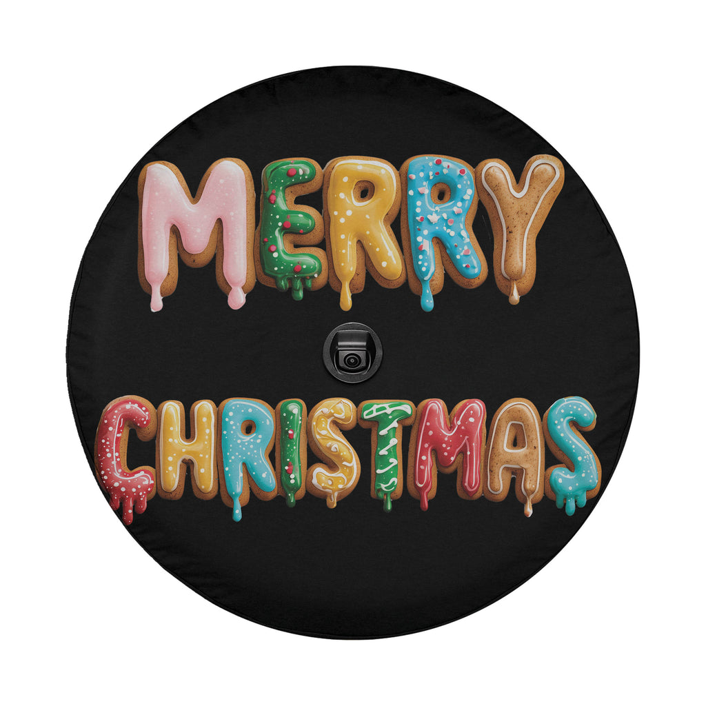 A black tire cover with the text "MERRY CHRISTMAS" written in colorful, dripping letters.