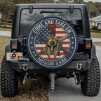the back of a black Jeep Wrangler with a large American flag-themed wheel cover featuring a helmet and crossed swords.