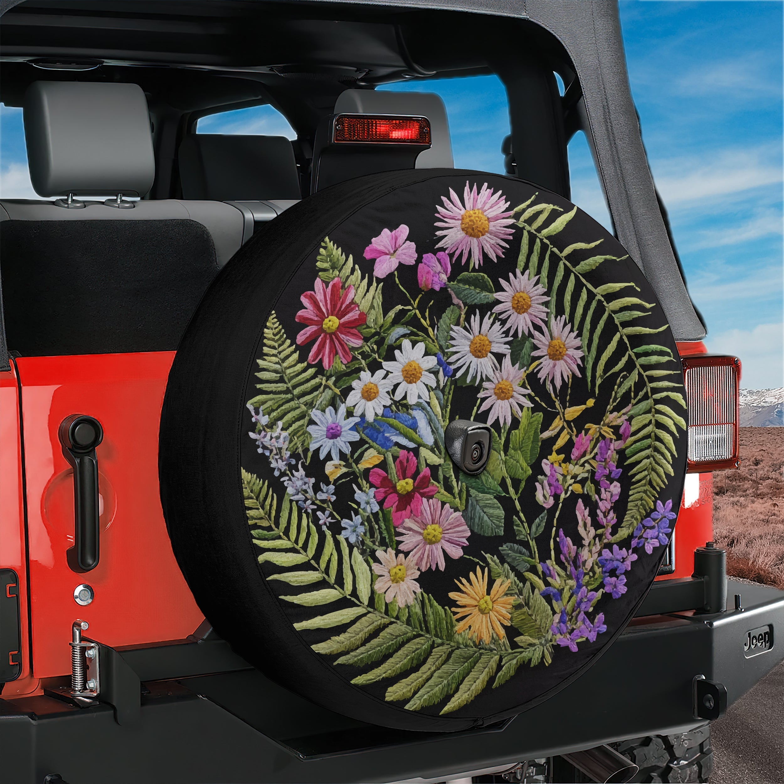Faux embroidery wildflowers spare tire cover closeup of floral stitching artwork detail