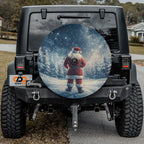 Festive Santa Claus winter wonderland spare tire cover installed on a Jeep Wrangler tailgate