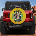 Warning Karen on Board spare tire cover yellow sign with cartoon blonde woman holding green telephone