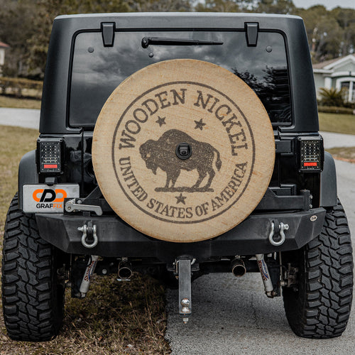 American buffalo wooden nickel spare tire cover on red Ford Bronco with vintage bison coin