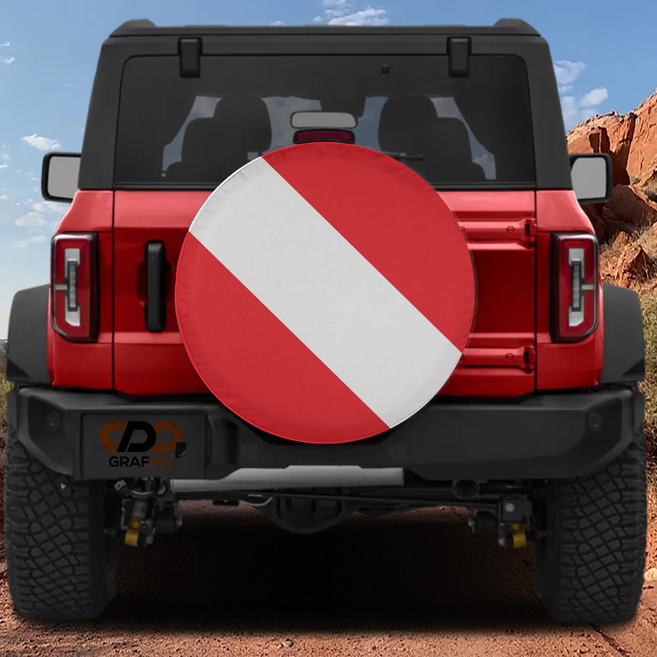 SCUBA diver down flag red and white striped spare tire cover on red Ford Bronco SUV