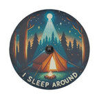 Flat round I sleep around camping tire cover closeup with orange tent glowing campfire and starry pines