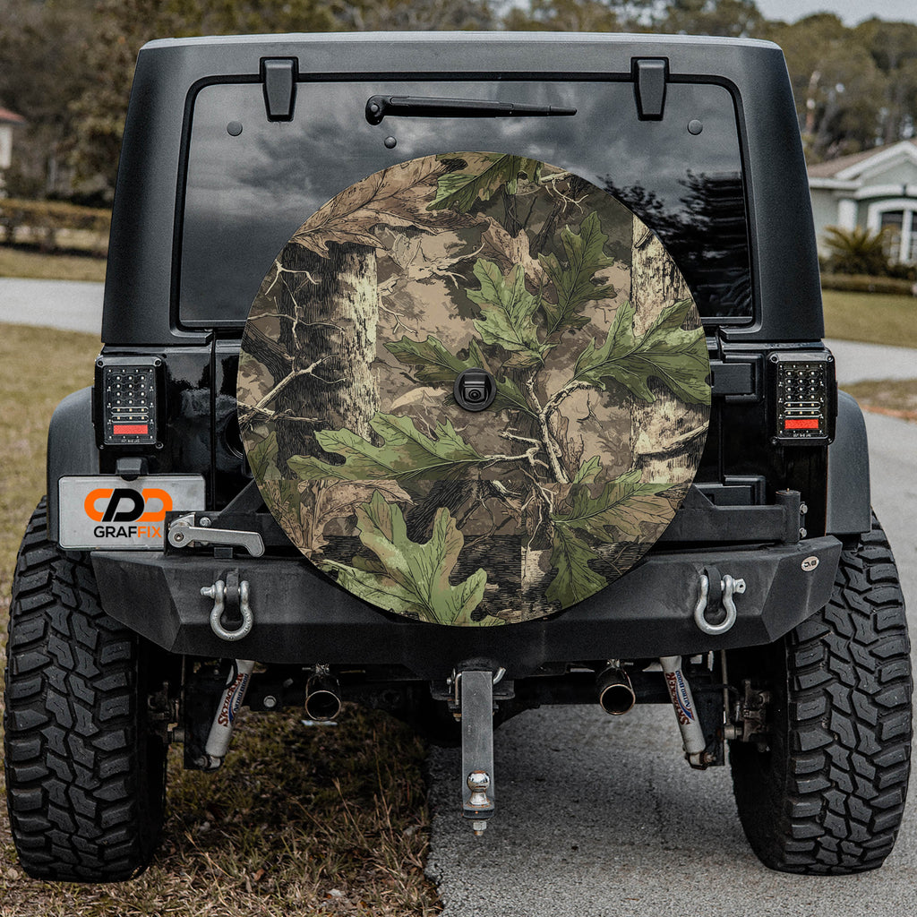 the rear of a black Jeep Wrangler with a camouflage-patterned spare tire attached to the vehicle.