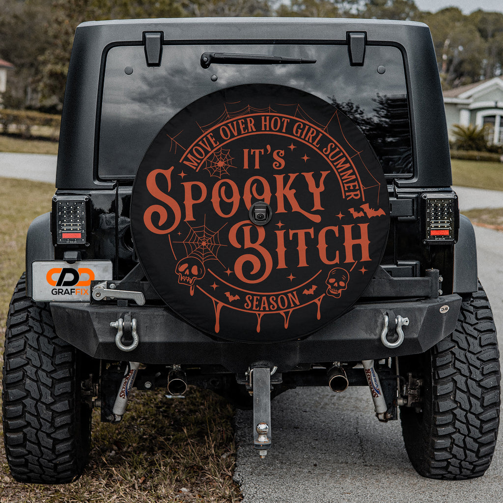 Spooky Bitch Season Halloween tire cover lifestyle shot mounted on rear of Jeep Wrangler