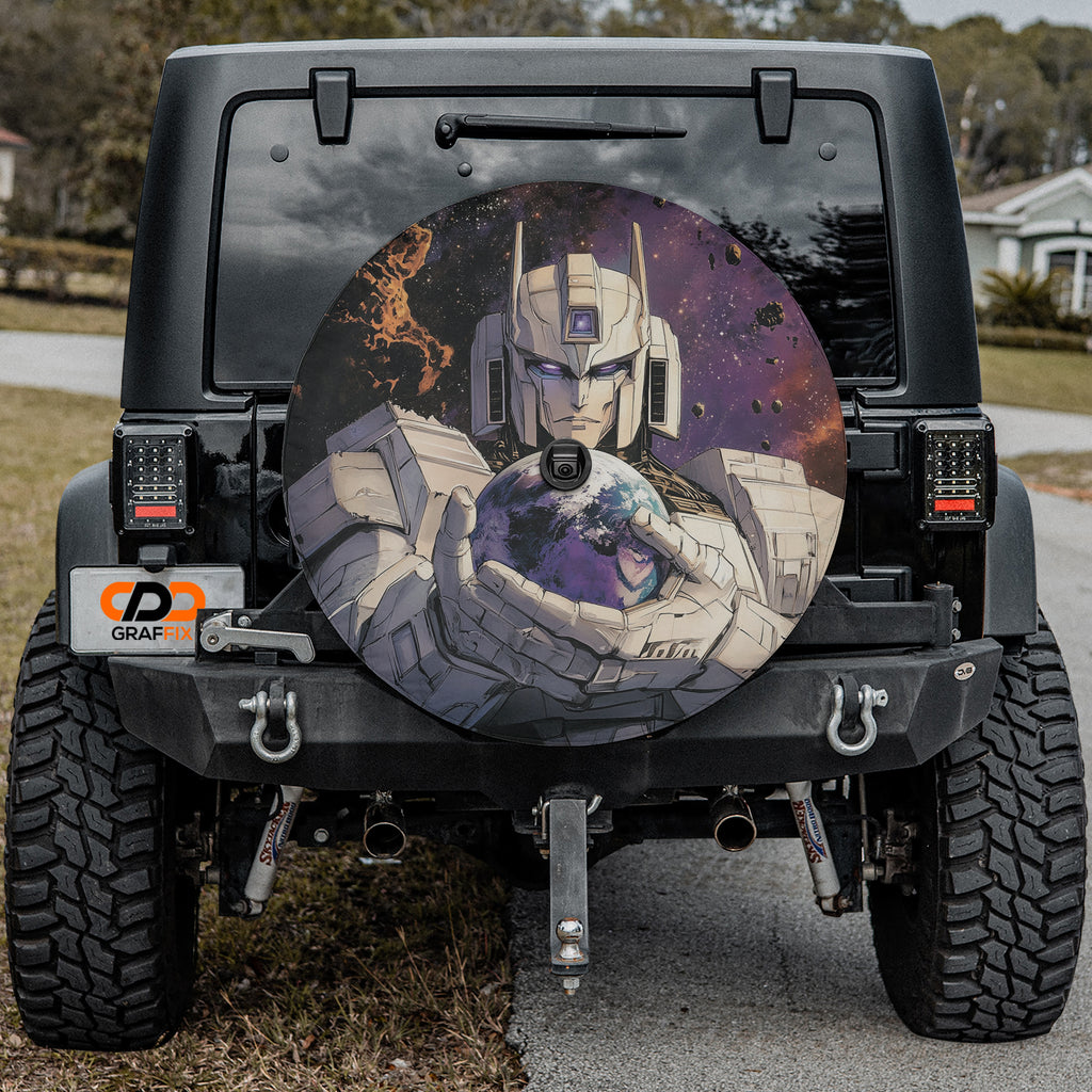 AstroBot Sentinel spare tire cover installed on black Jeep Wrangler with GRAFFIX plate art