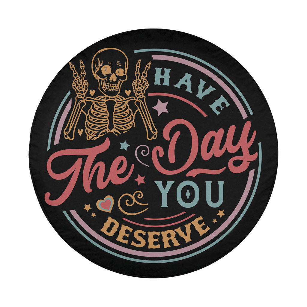 Have the Day You Deserve spare tire cover lifestyle view with sassy skeleton stamp print on Jeep