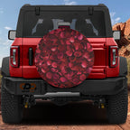Romance Bloom spare tire cover on red Bronco showing scattered red rose petal floral pattern