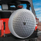 Golf ball spare tire cover flat-lay product photo showing realistic dimpled surface