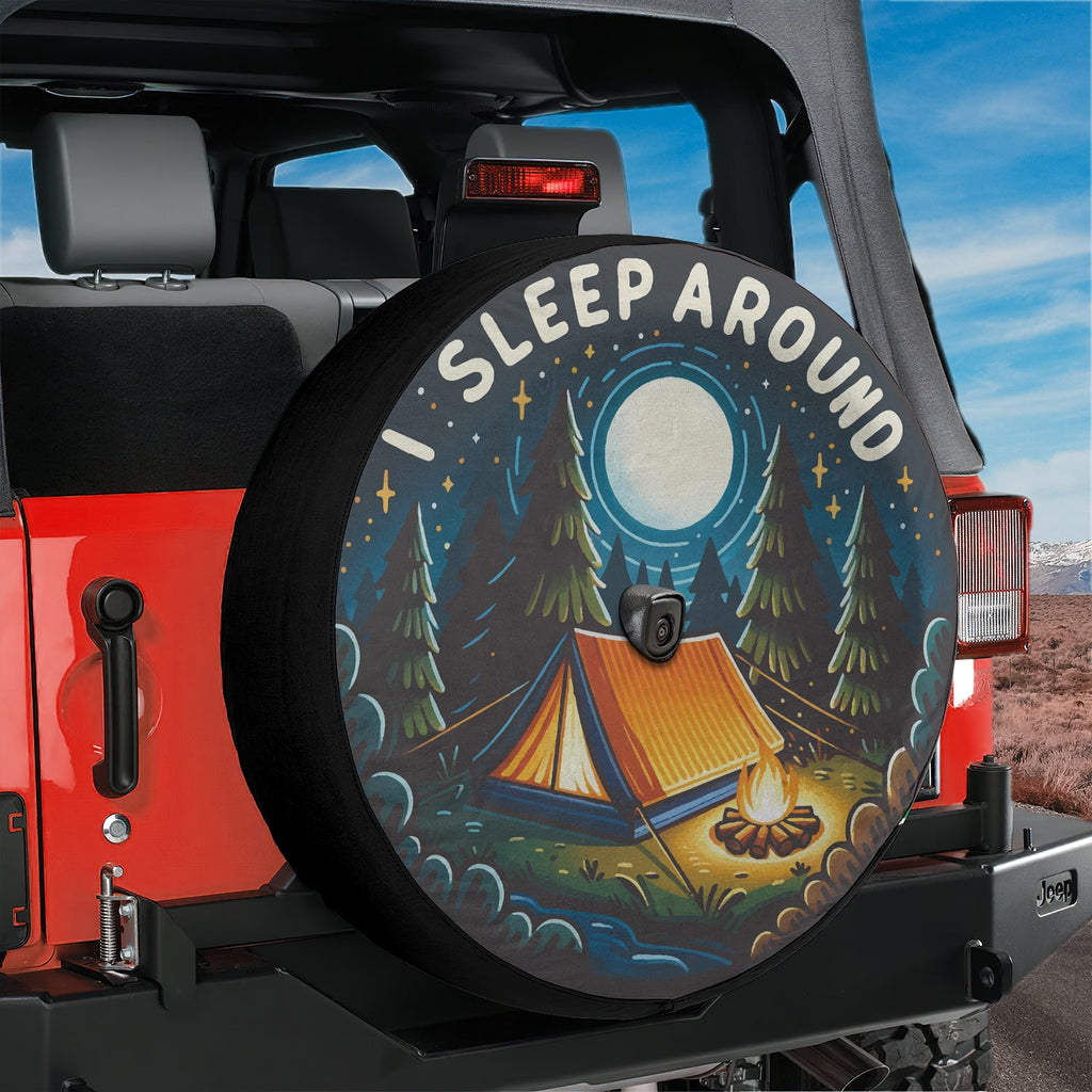 I sleep around camping edition tire cover on a red Jeep Wrangler with tent campfire pines camera hole