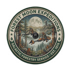 a circular emblem with a forest scene and a large moon in the background. The emblem is surrounded by a green border and includes various elements such as trees, a river, and a large moon.
